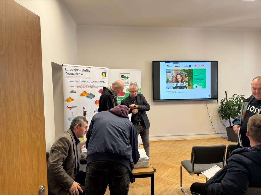 Zdjęcie przedstawia uczestników spotkania.